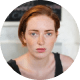 Portrait of a woman with short brown hair